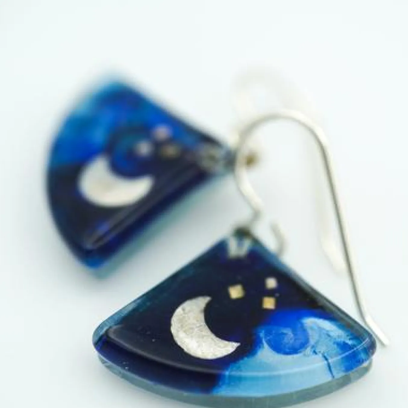 Momo. Earrings. Blue Moon Fans.
